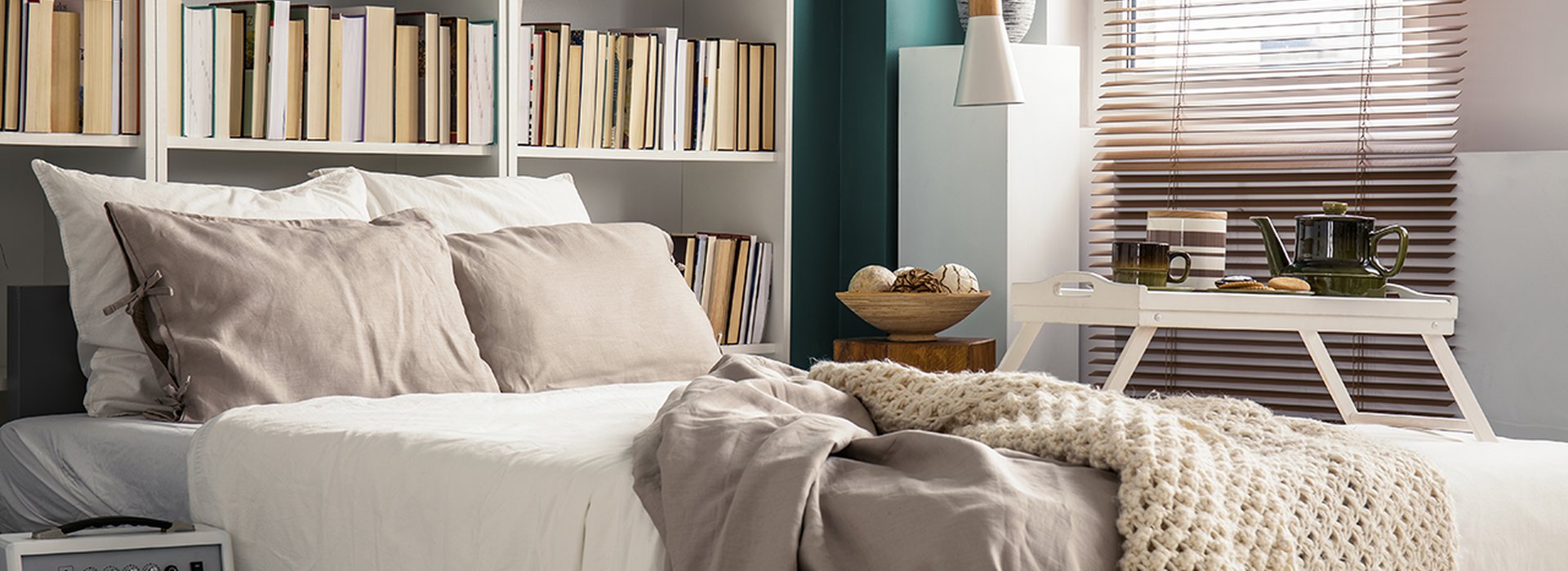 cozy bedroom and library set up